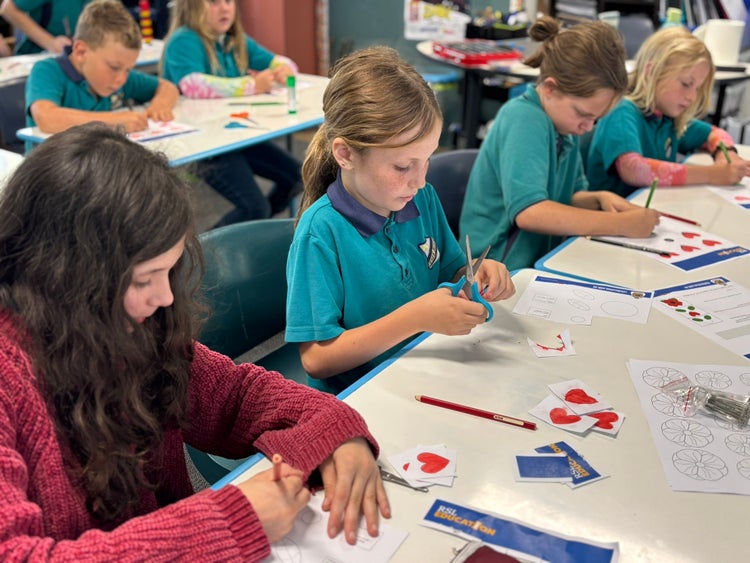 students working in class together