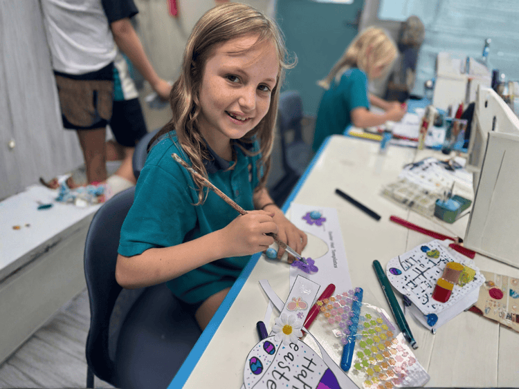 Student doing art work